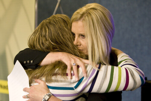 Janette Fennell hugging a grieving parent