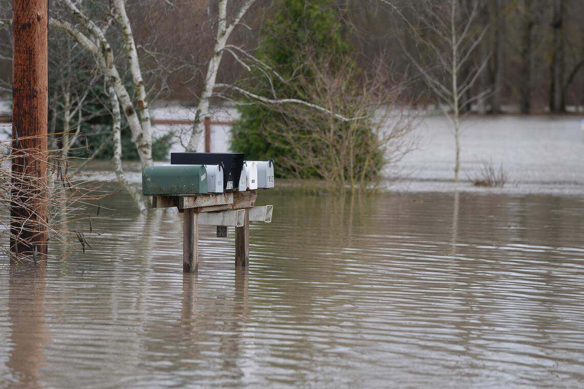 Mailboxes surrounded by a foot of water